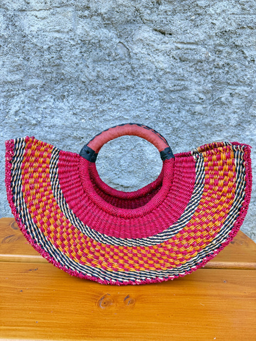 Handgeflochtene Bolga Handtasche in Melonenform aus Savannengras mit runden Ledergriffen