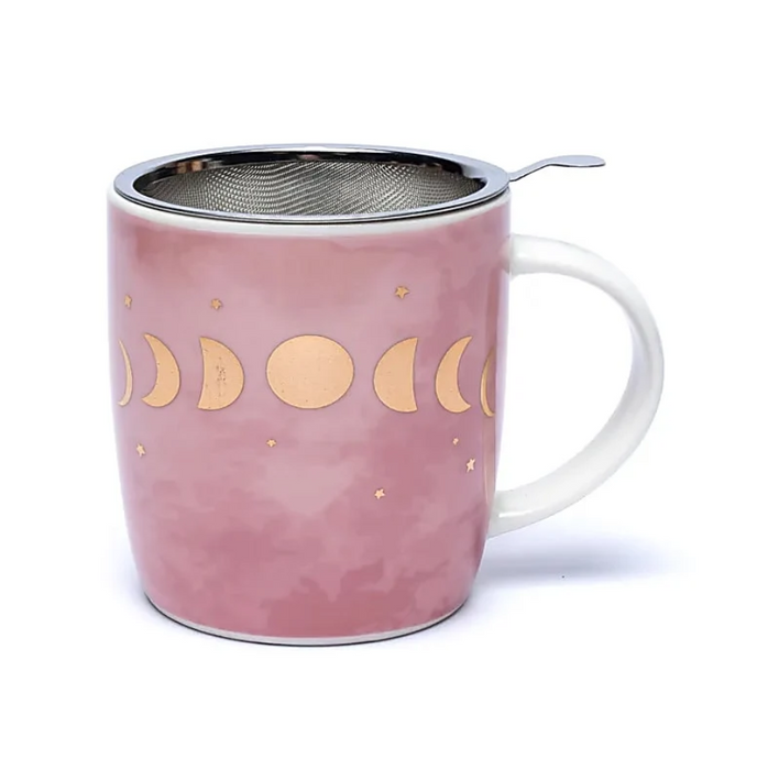 Rosafarbene Teetasse mit goldfarbenen Mondphasen, kleinen Sternen und weissem Henkel